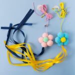 اسباب بازی شنگول زنگوله دار گربه مدل گل-1